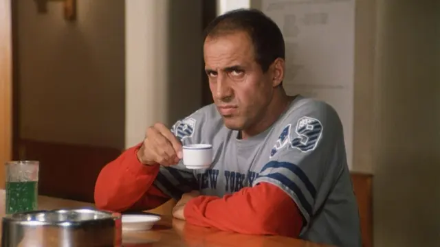 Celentano with cup meme template